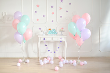 Decorations for holiday party. A lot of balloons pink and blue colors. 
