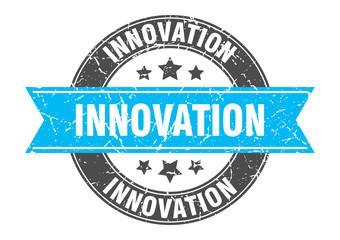 innovation round stamp with turquoise ribbon. innovation