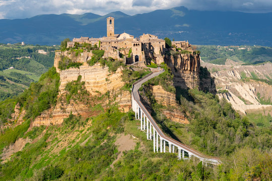 Panoramic view of historic town of Civita di Bagnoregio with surrounding hills and valleys of Lazio, Civita di Bagnoregio, Italy.