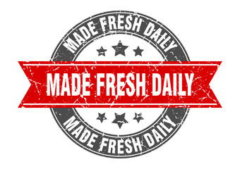 made fresh daily round stamp with red ribbon. made fresh daily