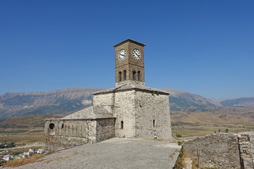 Fototapeta na wymiar Sahat Kula Clock Tower in a medieval castle-fortress in Gjirokaster Albania