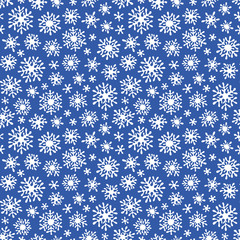 Christmas seamless doodle pattern with snowflakes