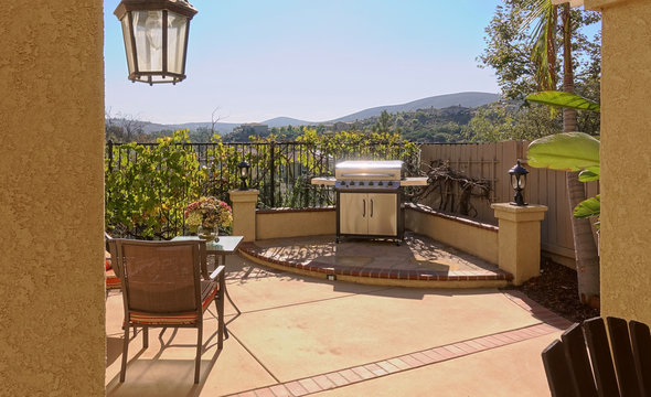 Outdoor Living Space With BBQ In Southern California Home