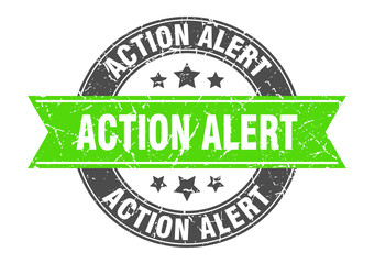 action alert round stamp with green ribbon. action alert