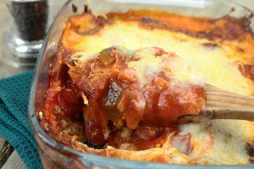 moussaka dish and salad