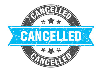 cancelled round stamp with turquoise ribbon. cancelled