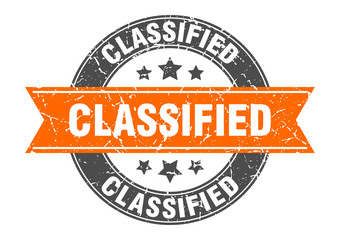 classified round stamp with orange ribbon. classified