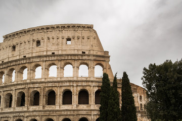 Naklejka premium Colosseum in Rome with cloudy sky on a rainy day