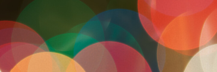 Colourful festive multi-colored circles . Defocused abstract multicolored bokeh lights background.