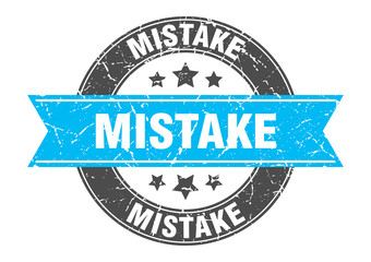 mistake round stamp with turquoise ribbon. mistake