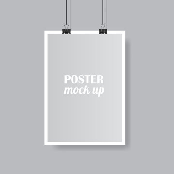 Vector poster mock up with white frame isolated on grey background with soft shadow. Realistic empty grey poster template ready for your design. Binder keeps placard.