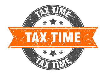 tax time round stamp with orange ribbon. tax time