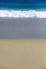 Soft beautiful Caribbean sea wave on sandy beach