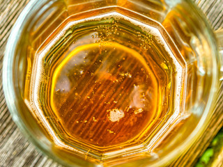 beer in a mug on top with bubbles