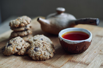 Cookies with tea on a wooden table