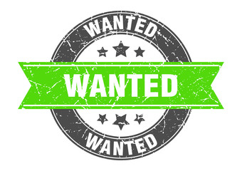 wanted round stamp with green ribbon. wanted