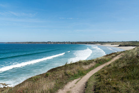 ground swell waves rolling on the Blancs Sablons beach in Brittany