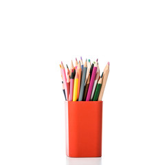 pen holder with colorful pencils on white