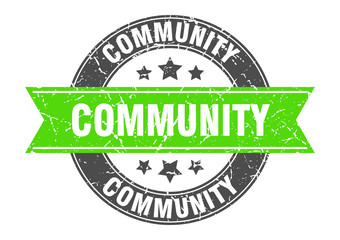 community round stamp with green ribbon. community