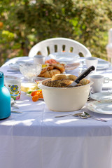 Outdoor spring or summer casual garden party set up for lunch dinner