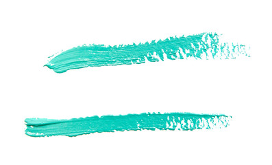 Paint brush strokes texture turquoise watercolor isolated on a white
