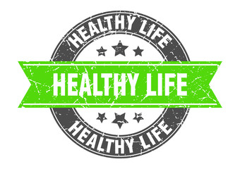 healthy life round stamp with green ribbon. healthy life