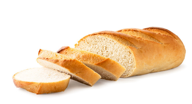 Loaf of white bread cut into pieces close-up. Isolated