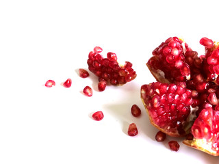 Red pomegranate fruit, isolated on a white background