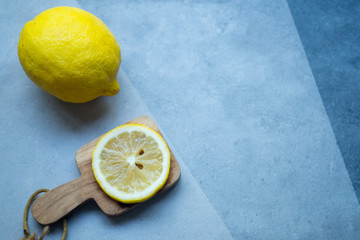 Ripe slice of yellow lemon citrus fruit
