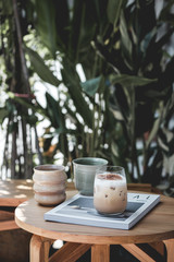cup of coffee on wooden table