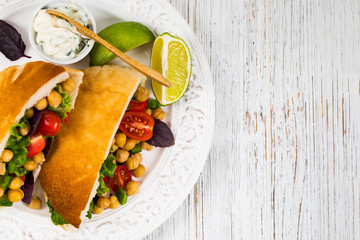 Garbanzo Bean or Chickpea Salad Veggie Pitas. Selective focus.