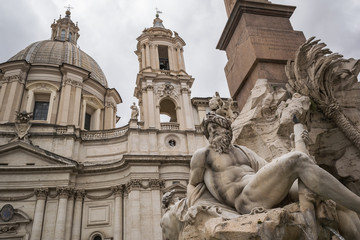 Fototapeta na wymiar Fontana dei Fiumi in Piazza Navona in Rome. Bernini's work.