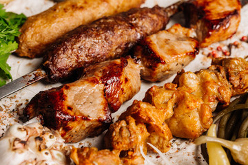 Barbecue meat. Grilled pork skewers on plate. Menu concept.