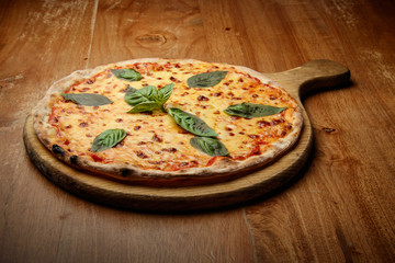 pizza with basil, Italian dish, pizzeria, presentation and serving, menu, beautifully decorated dish, delicious food, pizza, tasty and hot pizza, greens, pizza wooden board, basil