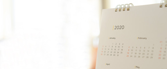 close up side view on white  calendar 2020 month schedule background to make appointment meeting or...