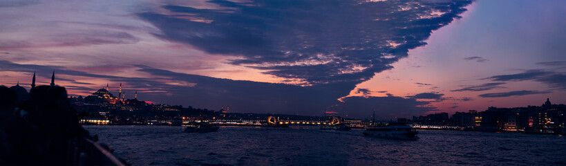 city with purple sunset