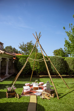 Tipi Made Of Sticks As A Wedding Decoration