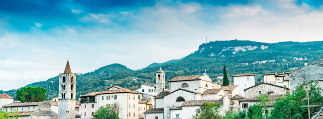 view on mountain and houses of historical town Ascoli Piceno, Italy