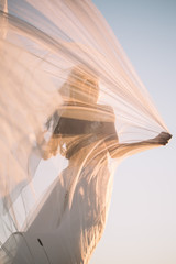 Beautiful bride outdoors in a forest. © liliyabatyrova
