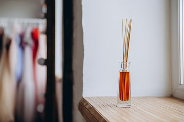 Portrait of an attractive blonde woman poses for the advertisement of a women's clothing store