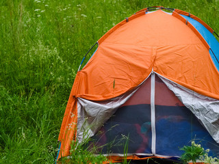 Dome tent, installed in the camp, with open awning for ventilation