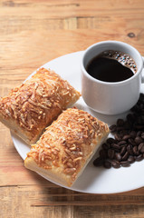 Puff pastry cookies with cheese and coffee