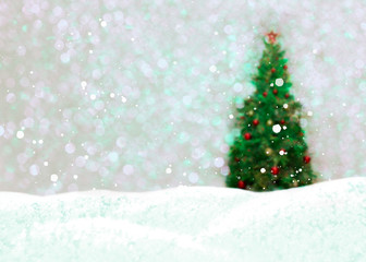Christmas background with New Year tree, framed by bright lights and snowdrifts with snowflakes.