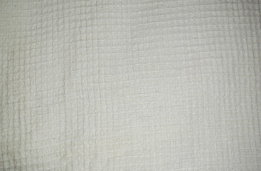 White waffle towel with led lamp on it.