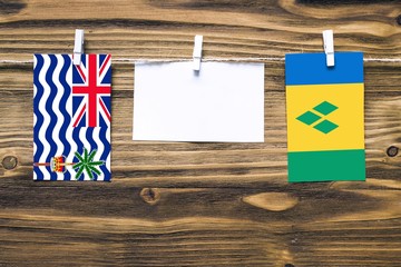 Hanging flags of British Indian Ocean Territory and Saint Vincent And The Grenadines attached to...