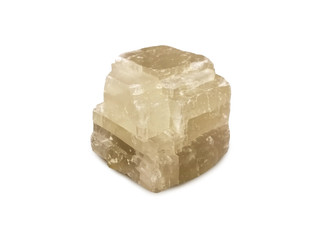 Calcite isolated on white background. Calcite is a carbonate mineral and the most stable polymorph of calcium carbonate. There is noise and grain caused by the texture of the stone.