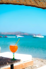 Orange drink at the beach.