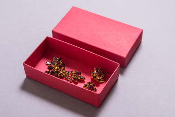 Red carton gift box with jewelry, mock up isolates