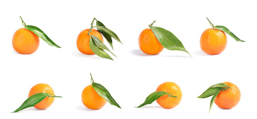 Set of fresh ripe tangerines on white background