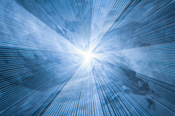 abstract blue background with diverging light rays